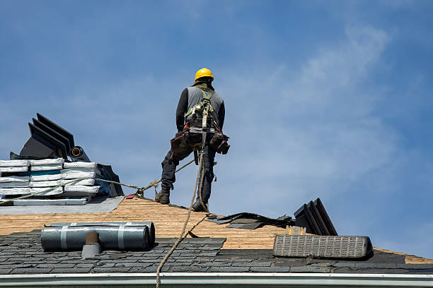 Professional Roof Replacement technician working in Scarville, IA